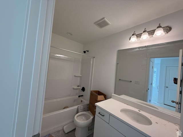 bathroom with toilet, vanity,  shower combination, a textured ceiling, and visible vents