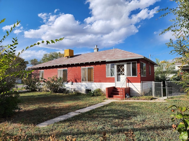 383 S 100 W, Price, UT 84501 - view of front of property with a gate, a shingled roof, cooling unit, and a chimney