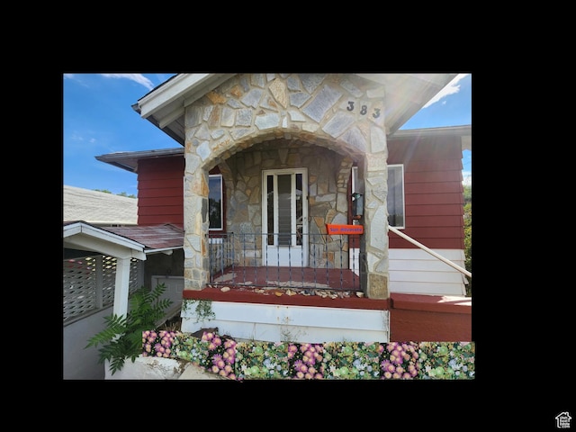 383 S 100 W, Price, UT 84501 - doorway to property with stone siding and a porch