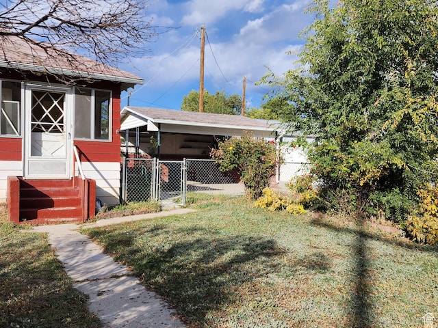 383 S 100 W, Price, UT 84501 - view of yard featuring entry steps, a carport, and a gate