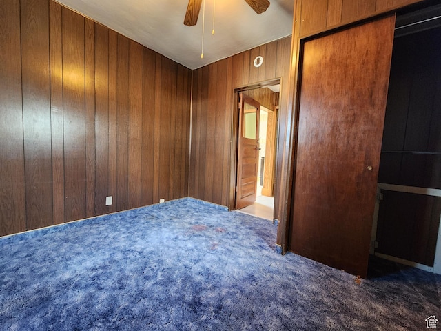 383 S 100 W, Price, UT 84501 - unfurnished room featuring carpet flooring, a ceiling fan, and wooden walls