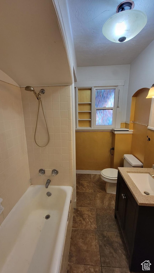 390 S 400 W, Logan, UT 84321 - bathroom featuring a textured ceiling, toilet, tub / shower combination, and vanity