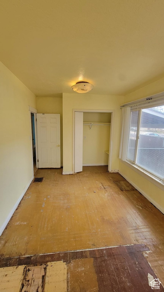 390 S 400 W, Logan, UT 84321 - unfurnished bedroom featuring baseboards and a closet