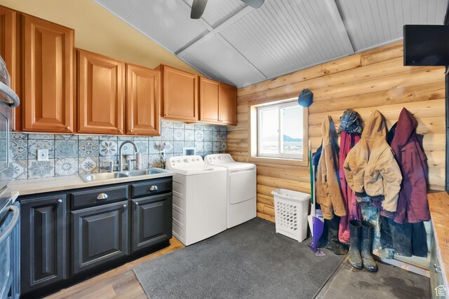 183 N Silver Sage Rd, Vernon, UT 84080 - washroom featuring washer and clothes dryer, log walls, a sink, ceiling fan, and cabinet space