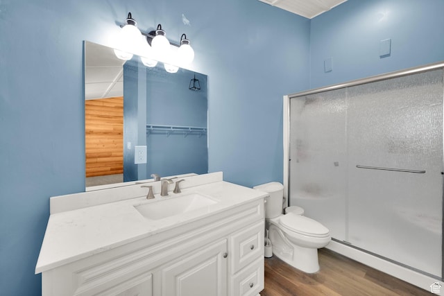 183 N Silver Sage Rd, Vernon, UT 84080 - bathroom with a shower stall, wood finished floors, toilet, baseboard heating, and vanity