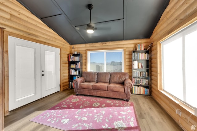 183 N Silver Sage Rd, Vernon, UT 84080 - living room with french doors, a ceiling fan, wood finished floors, lofted ceiling, and log walls