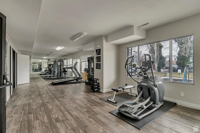 742 S 400 E Unit H102, Salt Lake City, UT 84111 - exercise room with baseboards, visible vents, and wood finished floors