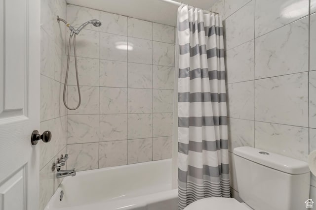 742 S 400 E Unit H102, Salt Lake City, UT 84111 - bathroom featuring toilet, shower / tub combo with curtain, and tile walls