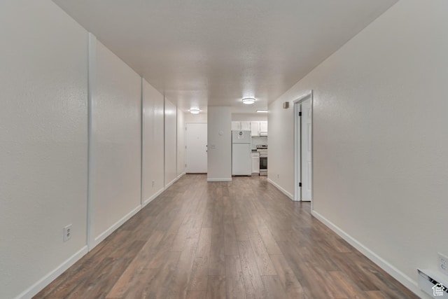 742 S 400 E Unit H102, Salt Lake City, UT 84111 - interior space with dark wood-style flooring and baseboards