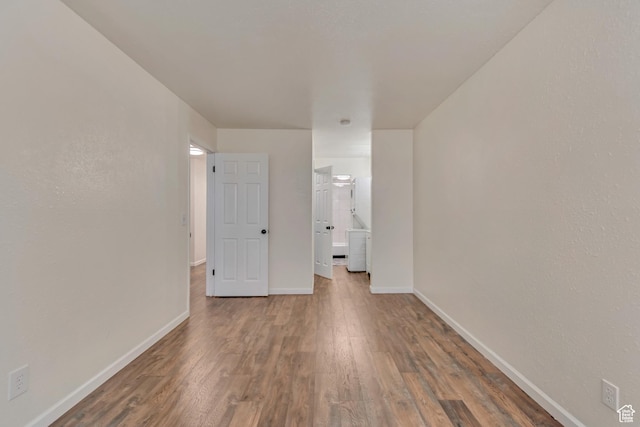 742 S 400 E Unit H102, Salt Lake City, UT 84111 - unfurnished room with baseboards and wood finished floors