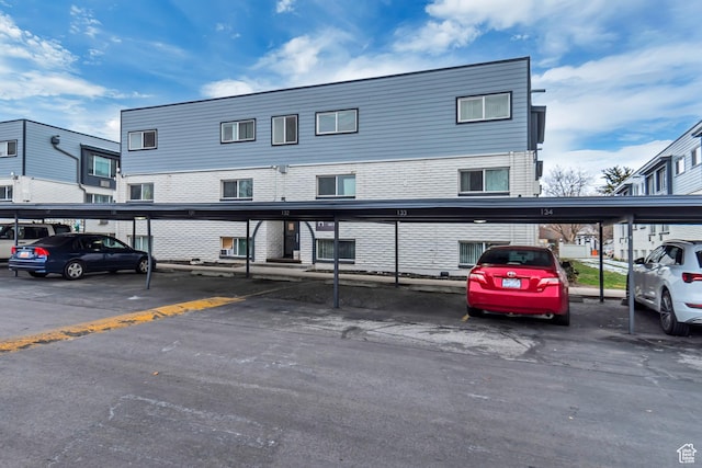 742 S 400 E Unit H102, Salt Lake City, UT 84111 - view of front facade featuring covered parking