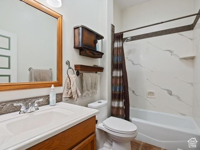 bathroom with shower / bath combo, toilet, tile patterned flooring, and vanity