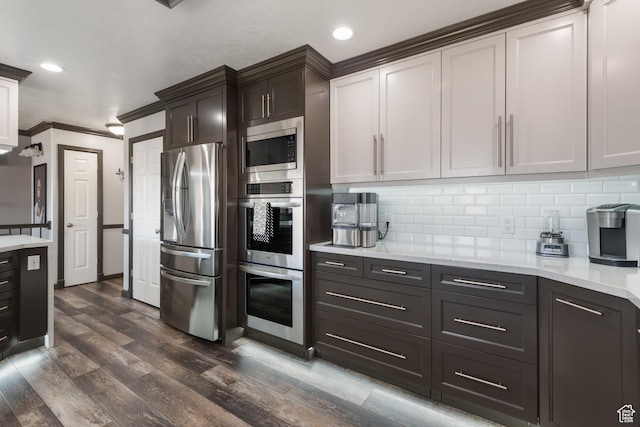 12381 S 3600 W, Riverton, UT 84065 - kitchen featuring light stone counters, backsplash, dark wood-style floors, stainless steel appliances, and recessed lighting
