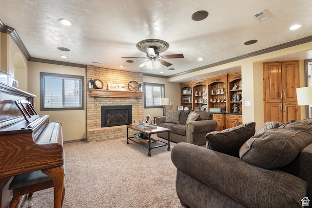 12381 S 3600 W, Riverton, UT 84065 - carpeted living room featuring a fireplace, a textured ceiling, visible vents, ceiling fan, and ornamental molding