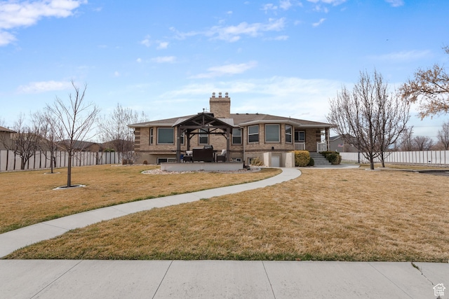12381 S 3600 W, Riverton, UT 84065 - view of front facade featuring fence, an attached garage, a chimney, a front yard, and a patio area