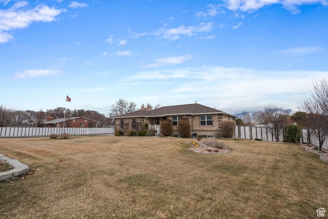 12381 S 3600 W, Riverton, UT 84065 - view of front of house featuring a front yard and fence