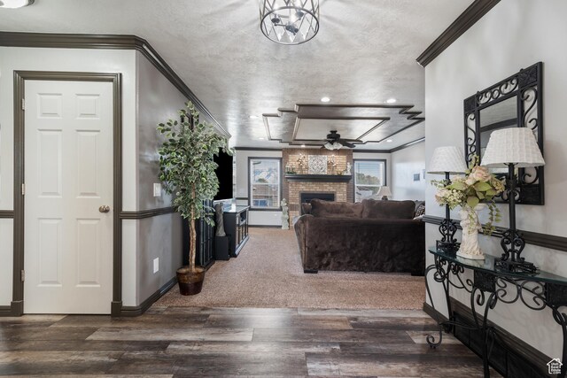 12381 S 3600 W, Riverton, UT 84065 - living room featuring crown molding, a brick fireplace, baseboards, ceiling fan, and wood finished floors