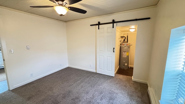 unfurnished bedroom featuring a barn door, dark colored carpet, baseboards, baseboard heating, and electric water heater