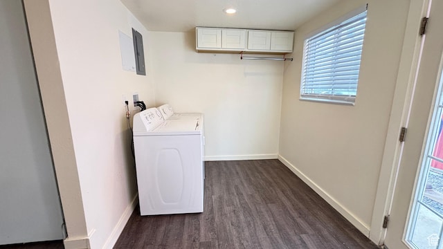 washroom with plenty of natural light, washer and dryer, laundry area, and dark wood finished floors