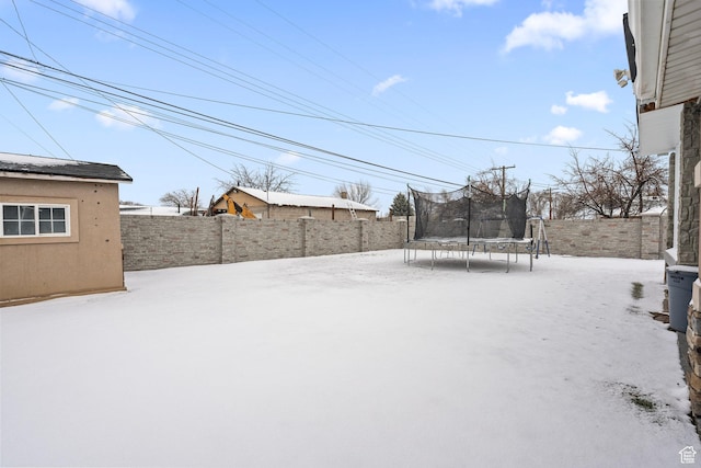 319 N 800 W, Orem, UT 84057 - snowy yard featuring fence and a trampoline