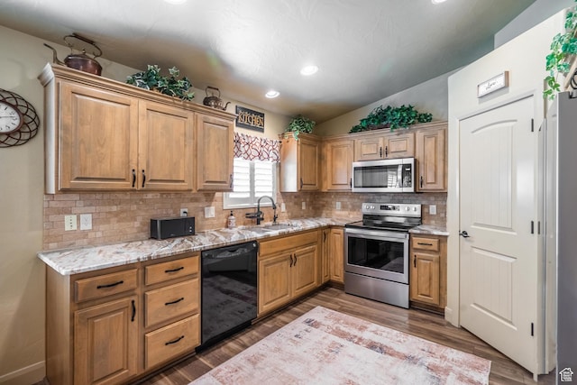 1369 W Country Club Dr, St George, UT 84790 - kitchen featuring light stone countertops, a sink, stainless steel appliances, and wood finished floors