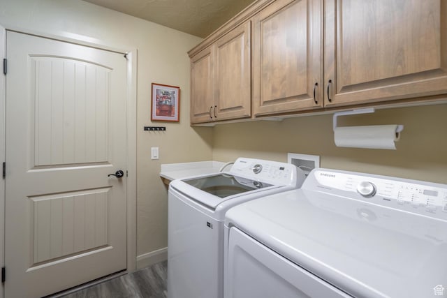 1369 W Country Club Dr, St George, UT 84790 - laundry room featuring baseboards, cabinet space, washing machine and dryer, and dark wood-style floors