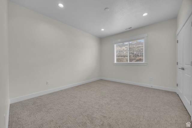 6579 W Bonnie Jean Ln Unit 12, Herriman, UT 84096 - unfurnished room featuring baseboards, visible vents, carpet floors, and recessed lighting