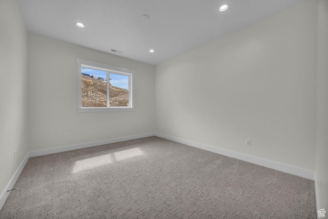 6579 W Bonnie Jean Ln Unit 12, Herriman, UT 84096 - carpeted spare room featuring baseboards, visible vents, and recessed lighting