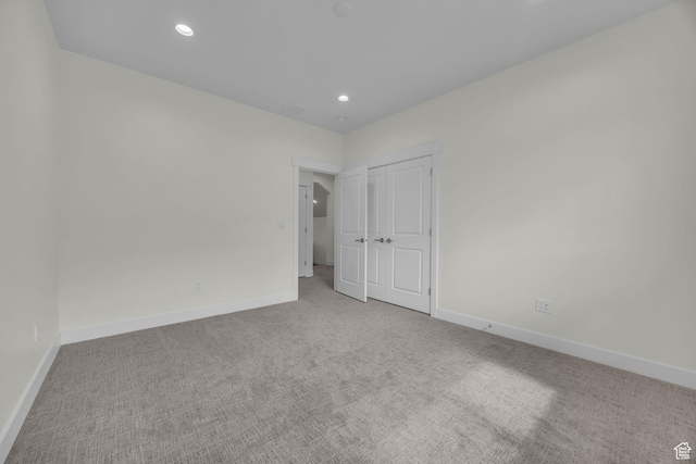 6579 W Bonnie Jean Ln Unit 12, Herriman, UT 84096 - unfurnished room with baseboards, carpet flooring, and recessed lighting