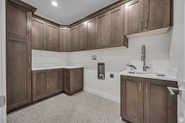 6579 W Bonnie Jean Ln Unit 12, Herriman, UT 84096 - clothes washing area featuring hookup for an electric dryer, hookup for a washing machine, baseboards, a sink, and cabinet space