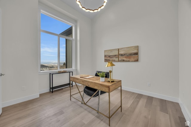 6579 W Bonnie Jean Ln Unit 12, Herriman, UT 84096 - office area featuring baseboards and light wood-style flooring