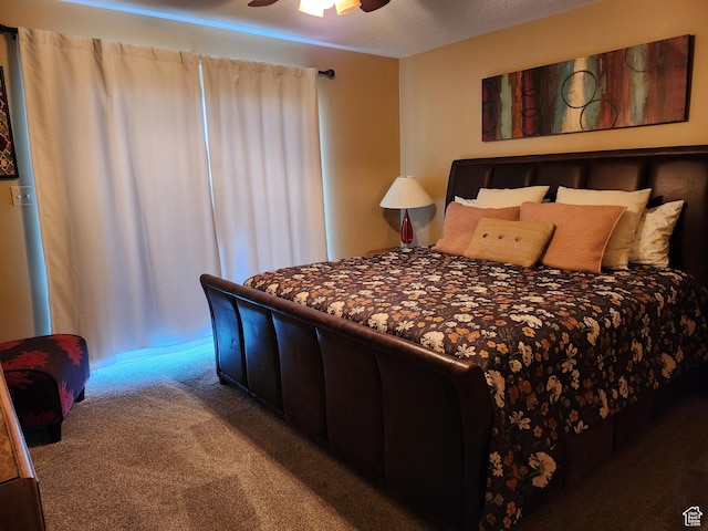 carpeted bedroom with a ceiling fan