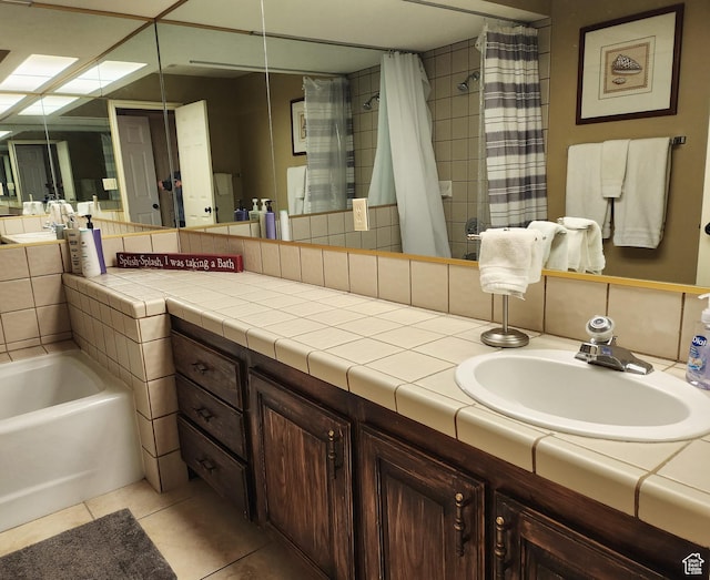 bathroom featuring backsplash, tile patterned floors, vanity, and a shower with shower curtain