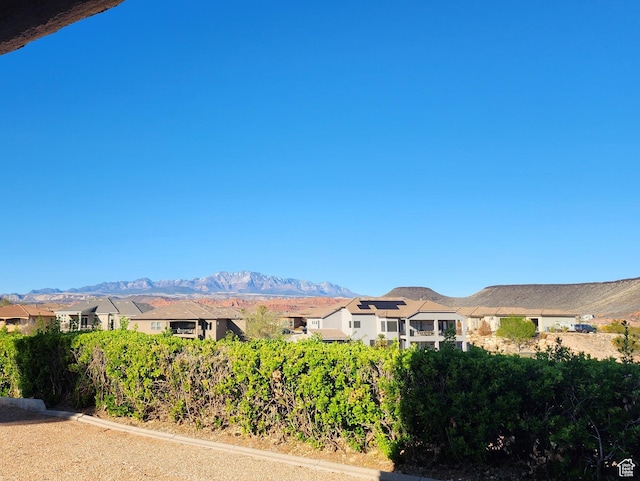 property view of mountains with a residential view
