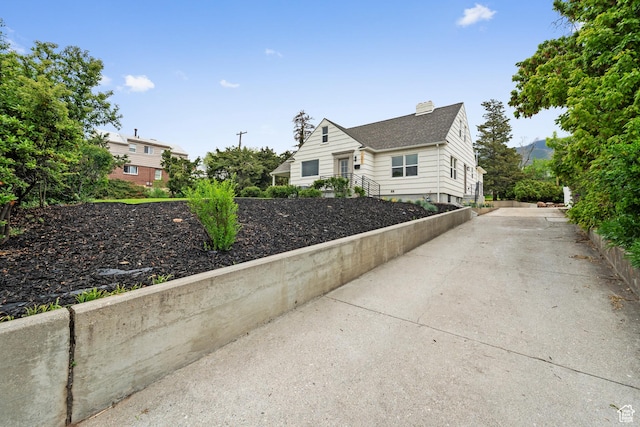 1585 S 2300 E, Salt Lake City, UT 84108 - view of side of home with a chimney