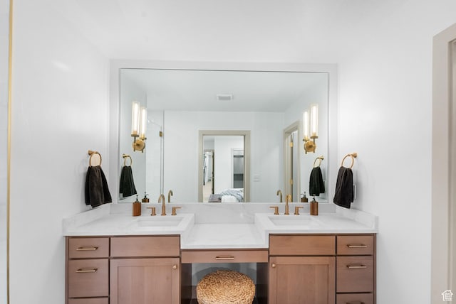 1585 S 2300 E, Salt Lake City, UT 84108 - bathroom featuring a sink, double vanity, connected bathroom, and visible vents
