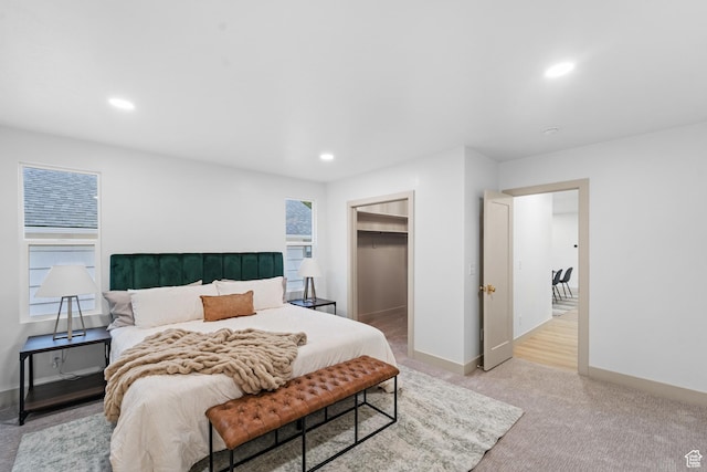 1585 S 2300 E, Salt Lake City, UT 84108 - bedroom with light colored carpet, baseboards, a spacious closet, and recessed lighting
