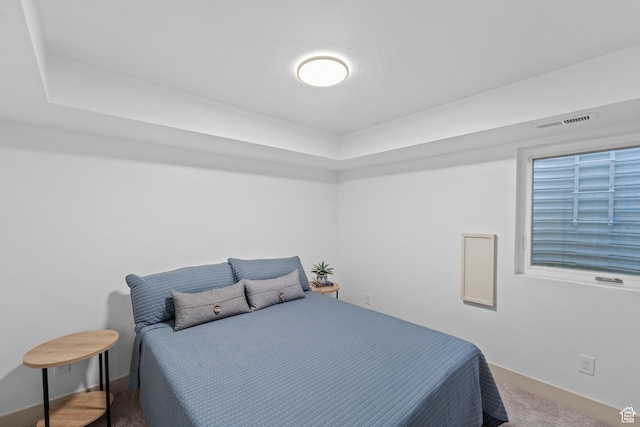 1585 S 2300 E, Salt Lake City, UT 84108 - carpeted bedroom featuring baseboards, a raised ceiling, and visible vents