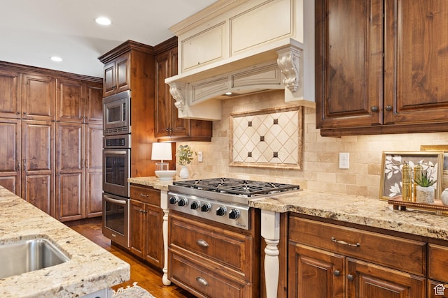 4721 W Country Club Dr, Highland, UT 84003 - kitchen with backsplash, stainless steel appliances, dark wood-type flooring, and light stone counters