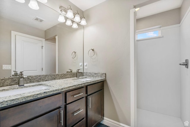 60 N 1100 W, Farmington, UT 84025 - full bathroom with double vanity, visible vents, baseboards, and a sink