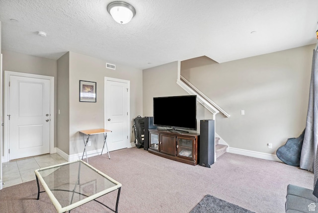 60 N 1100 W, Farmington, UT 84025 - carpeted living room with stairs, visible vents, baseboards, and a textured ceiling