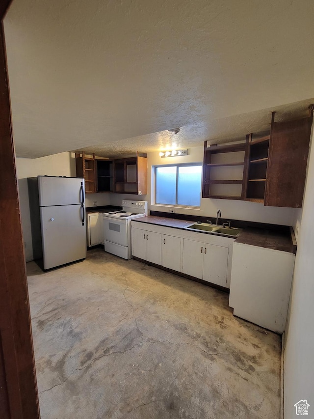 kitchen featuring white range with electric stovetop, dark countertops, open shelves, and freestanding refrigerator