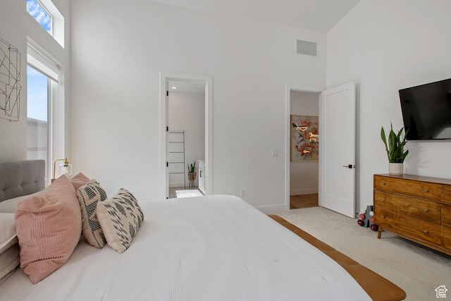 5516 N Valley View Rd, Lehi, UT 84043 - bedroom featuring baseboards, carpet floors, a towering ceiling, and visible vents