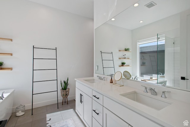 5516 N Valley View Rd, Lehi, UT 84043 - bathroom with visible vents, a sink, tile patterned flooring, and a soaking tub