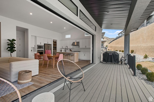 5516 N Valley View Rd, Lehi, UT 84043 - wooden deck with a grill, exterior kitchen, and a sink