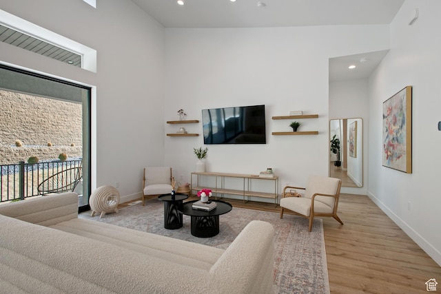 5516 N Valley View Rd, Lehi, UT 84043 - living room with baseboards, a towering ceiling, wood finished floors, and recessed lighting