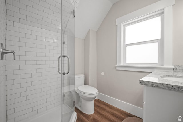 214 W 600 S, Heber City, UT 84032 - full bathroom with vaulted ceiling, toilet, baseboards, a shower stall, and wood finished floors
