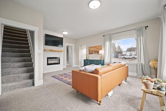 214 W 600 S, Heber City, UT 84032 - living room with baseboards, a glass covered fireplace, stairway, and carpet