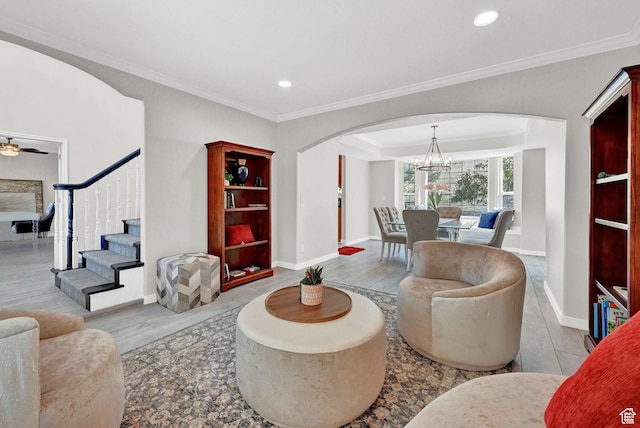 4216 N Wolf Creek Dr, Eden, UT 84310 - living area featuring crown molding, stairs, recessed lighting, baseboards, and arched walkways