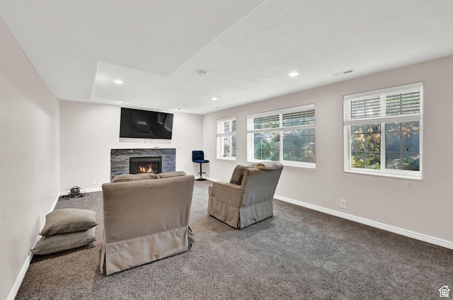 4216 N Wolf Creek Dr, Eden, UT 84310 - carpeted living area with recessed lighting, a glass covered fireplace, baseboards, and visible vents